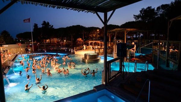Experience Le Sablons pool party at night!